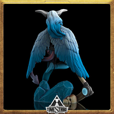 Luxuria Arctic miniature back view — succubus with pale icy-blue feathered wings folded over hooded form for TimeStrike & tabletop wargaming