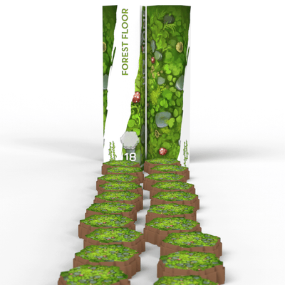 SOURCE Hex Pack Forest Floor 2-pack — two tall Forest Floor Hex Biome tubes with 18 pre-colored mossy green hex tiles arrayed for tabletop terrain